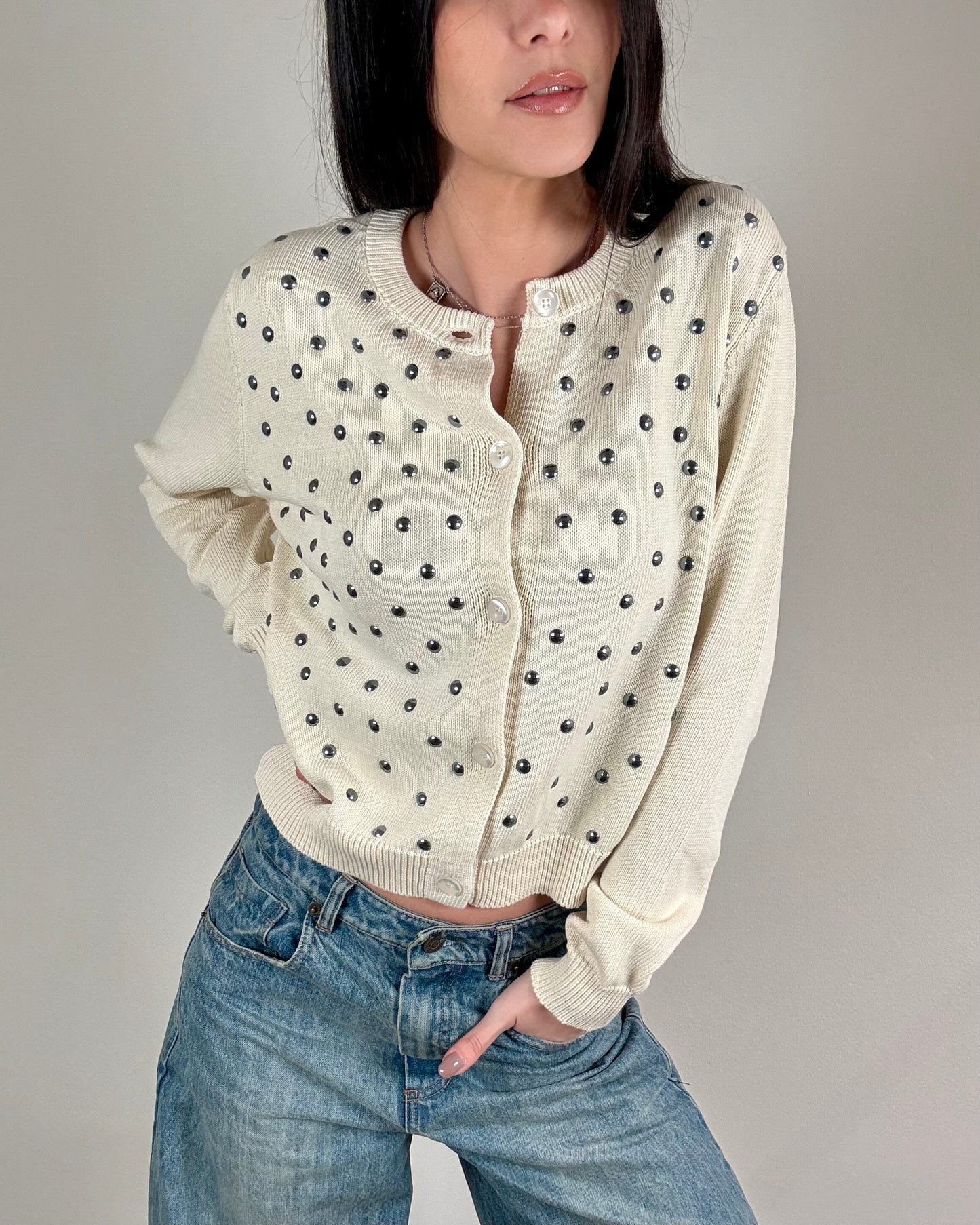 CARDIGAN CON BORCHIE